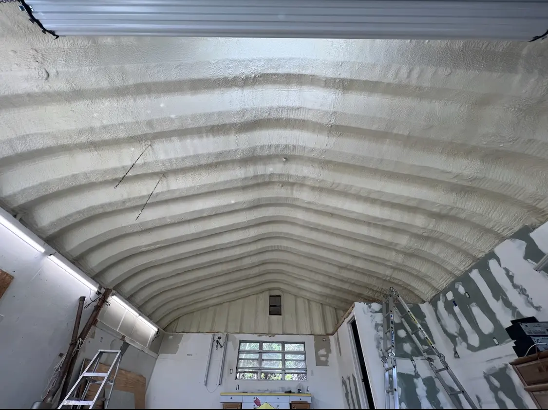 Spray polyurethane foam applied to the underside of a metal roof deck in Highland Springs